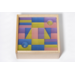 Transparante blokken pastel in een houten kist