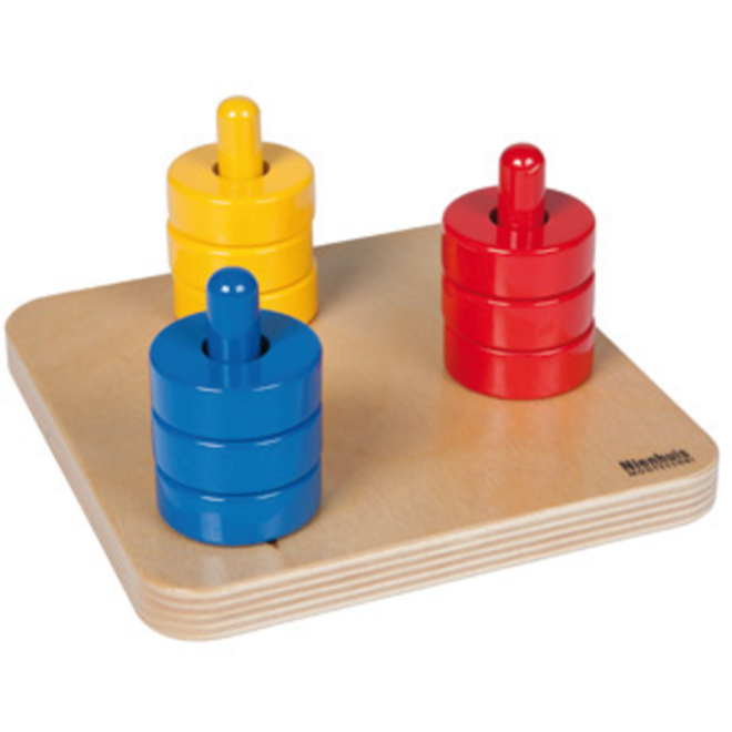 Gekleurde ringen op gekleurde pennen