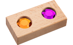 Juweelstenen in een houten kist